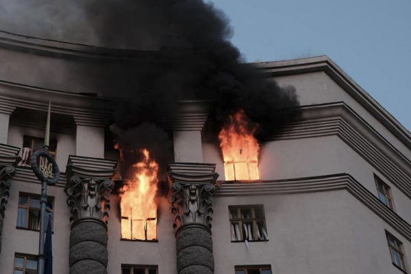 A handout photo released by the press service of the State Emergency Service of Ukraine shows smoke rising over the buildings housing Ukraine's cabinet in Kyiv, on Sunday. Photo by State Emergency Service of Ukraine/EPA