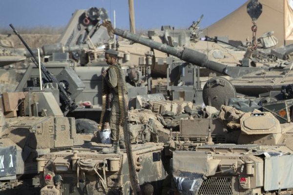 Israeli troops are seen here on armored personnel carriers that are staged along the Gaza Strip border in August. The Israel Defense Forces launched a missile strike into Doha, Qatar Tuesday in order to attack Hamas. Photo by Jim Hollander/UPI