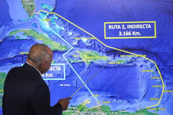 Diosdado Cabello, Venezuela's minister of the interior, Justice and peace, shows a map during a press conference in Caracas on Wednesday in accusing the U.S. Drug Enforcement Administration of conducting a 