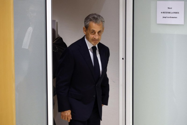 Former French President Nicolas Sarkozy leaves the courthouse in Paris on Thursday. Photo by Yoan Valat/EPA