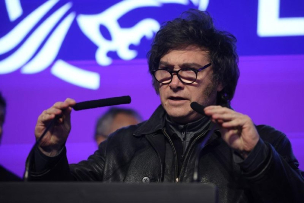 Argentine President Javier Milei speaks after learning the results of the legislative elections at a campaign center in La Plata, Buenos Aires, on Sunday. He said his La Libertad Avanza party suffered a 