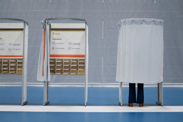 A person casts their ballot in the 2025 local elections at a polling station at Slattumhallen in Slattum, Norway on Monday. Photo by Gorm Kallestad/EPA