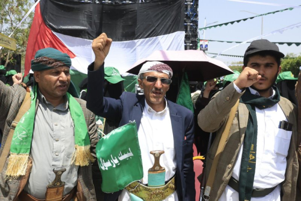 Protestors march in Sana'a after Israeli airstrikes killed the Houthi prime minister earlier this month. A Houthi-backed airstrike closed the Ramon Airport in Southern Israel Sunday. Photo by Yahya Arhab/EPA-EFE.