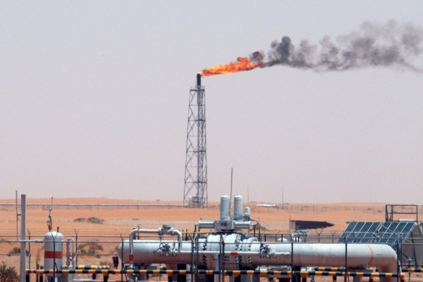 A gas flame is seen in the desert at Khurais oil field in Saudi Arabia in June 2008. File Photo by Ali Haider/EPA