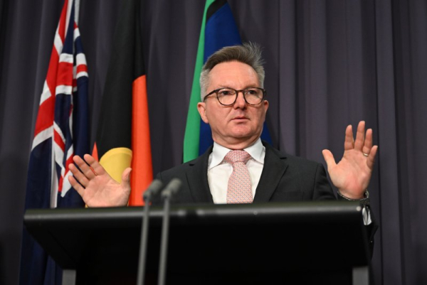 Australian Energy and Climate Change Minister Chris Bowen addresses the media at the release of the first major assessment of the risks climate change poses to the country. Photo by Lukas Coch/EPA
