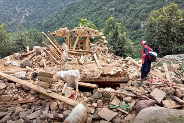 Members of the Afghan Red Crescent search for victims beneath rubble after an earthquake struck the provinces of Kunar and Nangarhar near Jalalabad on Sunday. There are now 2,205 people dead. Photo by Afghan Red Crescent