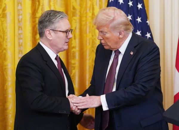 President Donald Trump (R) shakes hands with Prime Minister Keir Starmer on Britain in February. London announced Sunday that the United States and Britain are to sign a landmark nuclear power agreement later this week. File Photo by Bonnie Cash/UPI.