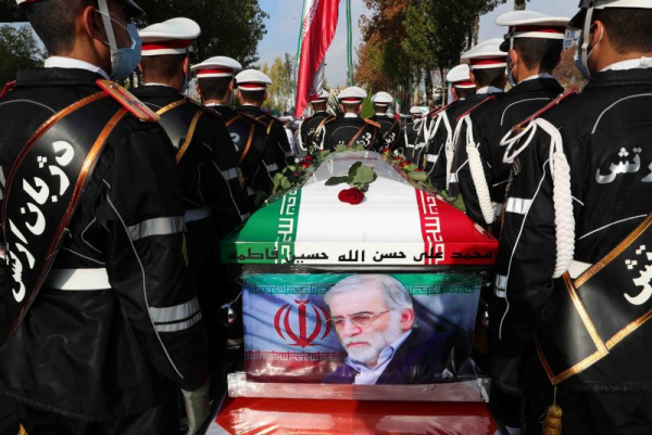 Soldiers carrying the coffin of slain Iranian nuclear scientist Mohsen Fakhrizadeh during funeral procession inside the Iranian defense ministry in Tehran, Iran, in 2020. European nations imposed 