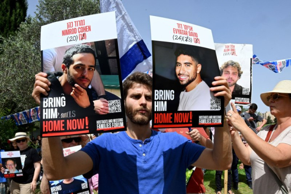Families and supporters of Israeli hostages held by Hamas in Gaza protest outside the office of Israeli Prime Minister Benjamin Netanyahu in Jerusalem in July. On Wednesday in Germany, three men suspected of being Hamas members were arrested on a number of charges. File Photo by Debbie Hill/ UPI