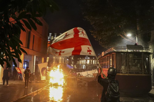 Unrest erupted after Georgian elections earlier this year. At least 21 people were injured in protests outside the Georgian presidential palace Saturday. Photo by David Mdzinarishvili/EPE-EFE