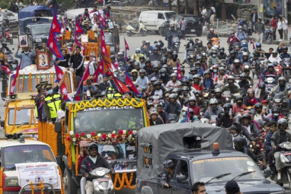 Demonstrators pay tribute on September 16 to those who died during the Gen-Z protest in Kathmandu, Nepal. The protest, which began September 8 and was led by youths identifying as Generation Z against corruption and a government-imposed social media ban, turned violent and left at least 72 people dead, including police officers. Photo by Narendra Shrestha/EPA
