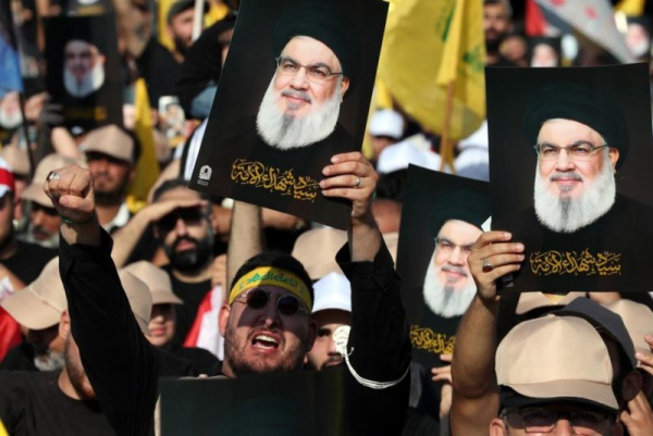 Supporters of the Lebanese Shia Islamist party and paramilitary group Hezbollah attend a gathering to mark the death anniversary of former Hezbollah leader Hassan Nasrallah outside his grave in Beirut, Lebanon, on Saturday. Nasrallah was killed in an Israeli airstrike targeting a Hezbollah command center in Haret Hreik, southern Beirut, on September 27, 2024. Photo by Wael Hamzeh/EPA