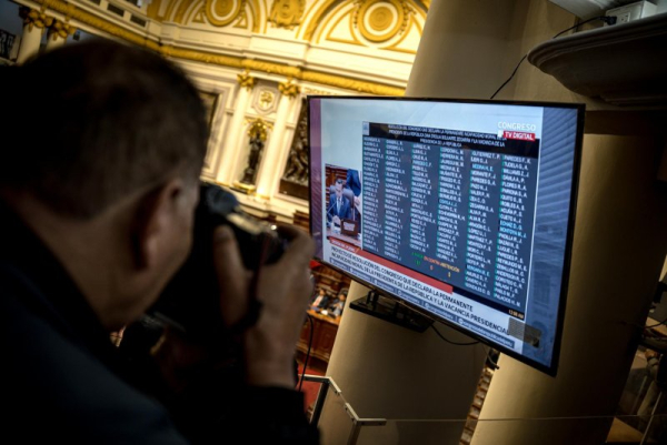 A view of a screen displaying the congressional vote to remove President Dina Boluarte from office, in Congress, Lima, Peru, late Thursday. The Peruvian Congress swiftly removed President Dina Boluarte from office after passing four motions of vacancy, with just six months remaining before the 2026 general elections. Photo by Paolo Aguilar/EPA