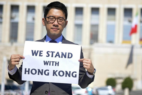 Exiled Hong Kong student activist Nathan Law, attended a protest outside Italian Ministry of Foreign Affairs in Rome in 2020. On Saturday, Law was denied entry to Singapore. File Photo by Riccardo Antimiani/EPA