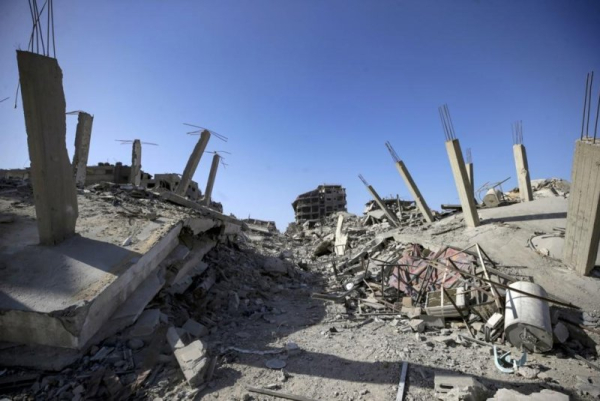 Destroyed houses await many of the returning residents of Gaza City as the withdrawal of Israeli forces and the delivery of humanitarian aid to Gaza were underway on Saturday. Photo by Mohammed Saber/EPA